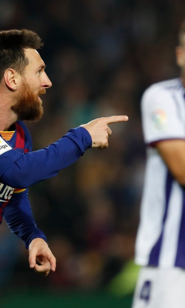 Messi scores 2, leads Barcelona to 5-1 rout of Valladolid